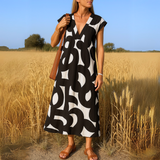 Magda - Vestido fluido con escote en V