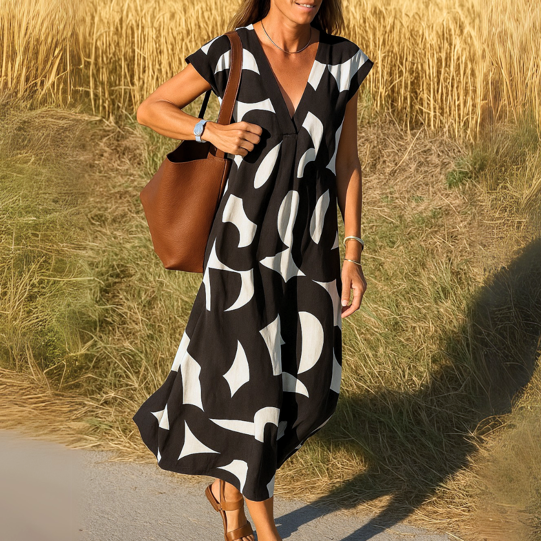 Magda - Vestido fluido con escote en V