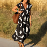 Magda - Vestido fluido con escote en V