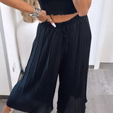 Maia - Pantalones Plisados Negros